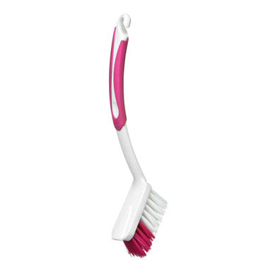 White and pink dish brush with a hook on a white background