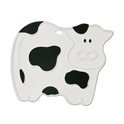 Cow-shaped object with black spots on a white background