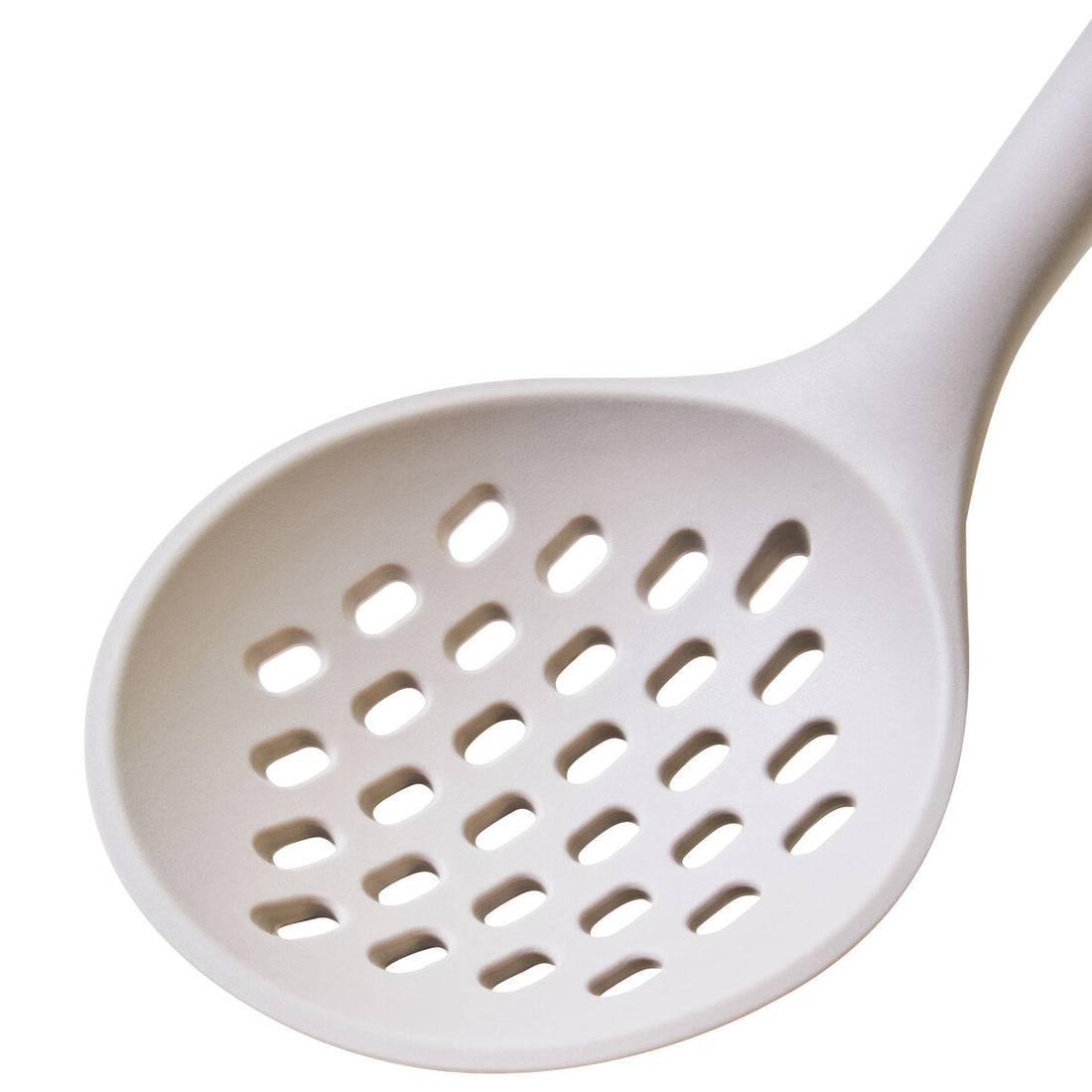 White kitchen utensil with a perforated design on a white background