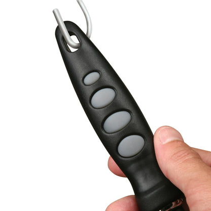 Black and gray remote control held by a hand on a white background