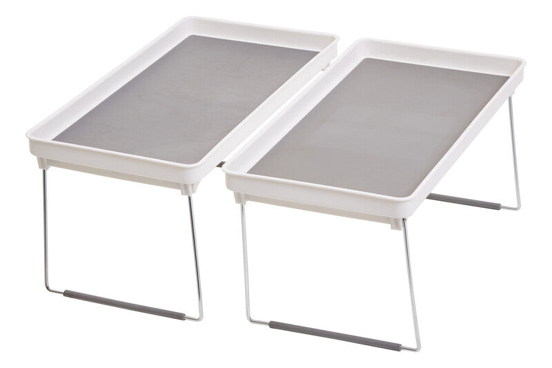 Two white trays with gray mesh on a white background
