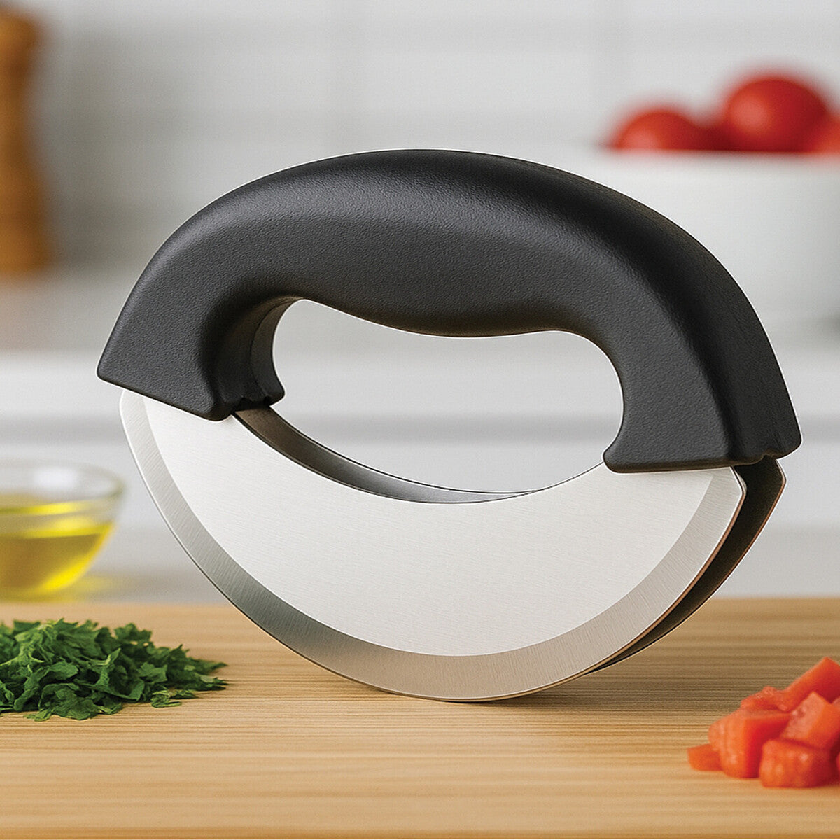 Black and silver kitchen tool on a wooden cutting board with vegetables in the background