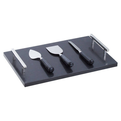 Set of cheese knives and spatulas on a black tray with a white background