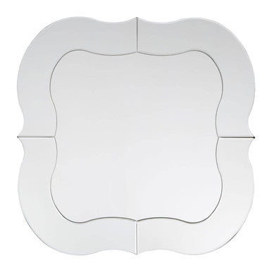 Decorative mirror with a white, scalloped edge on a white background