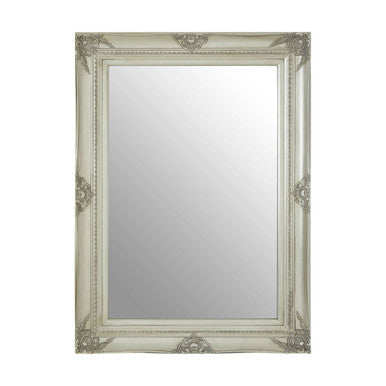Decorative mirror with an ornate frame on a white background