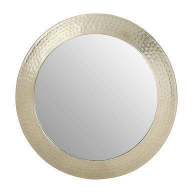 Round mirror with a textured gold frame on a white background
