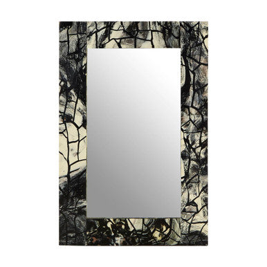 Rectangular mirror with a decorative black and white frame on a white background