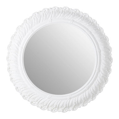 Round mirror with decorative white frame on a white background