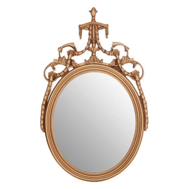 Decorative oval mirror with intricate gold frame on a white background