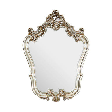 Decorative mirror with ornate frame on a white background