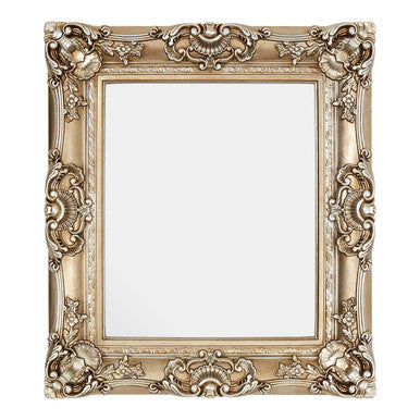 Decorative gold frame with intricate designs on a white background