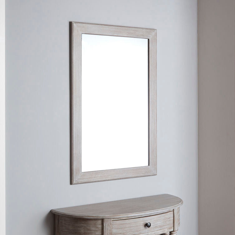 Wooden console table with a mirror on a light gray wall