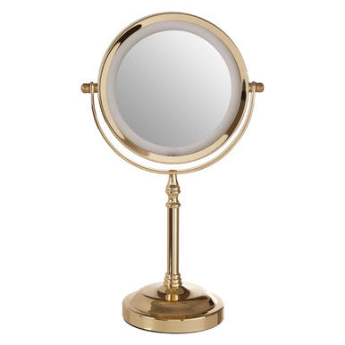 Gold vanity mirror on a white background
