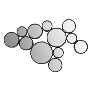 Set of circular mirrors of various sizes on a white background