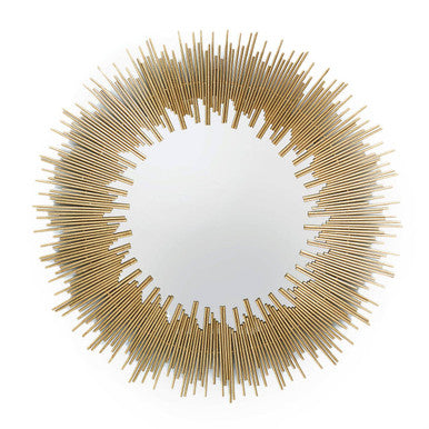Round mirror with gold sunburst frame on a white background