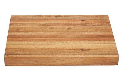 Wooden cutting board on a white background