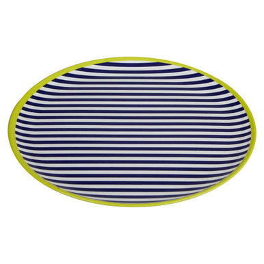 Oval plate with blue and white stripes and yellow rim on a white background