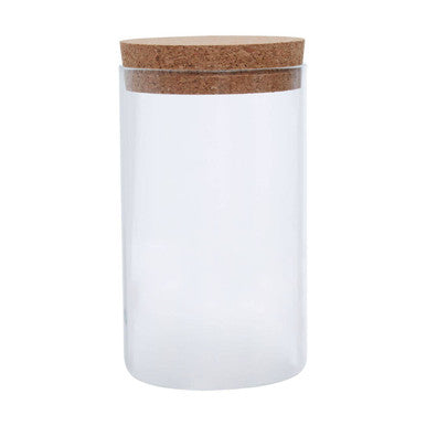 Clear glass jar with a wooden lid on a white background