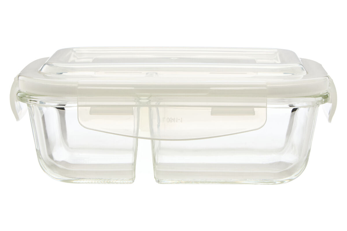 Clear glass food container with a lid on a white background