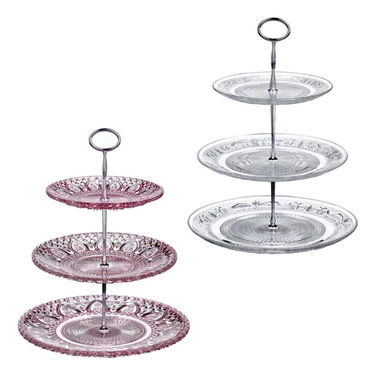 Two three-tiered glass cake stands with decorative patterns on a white background