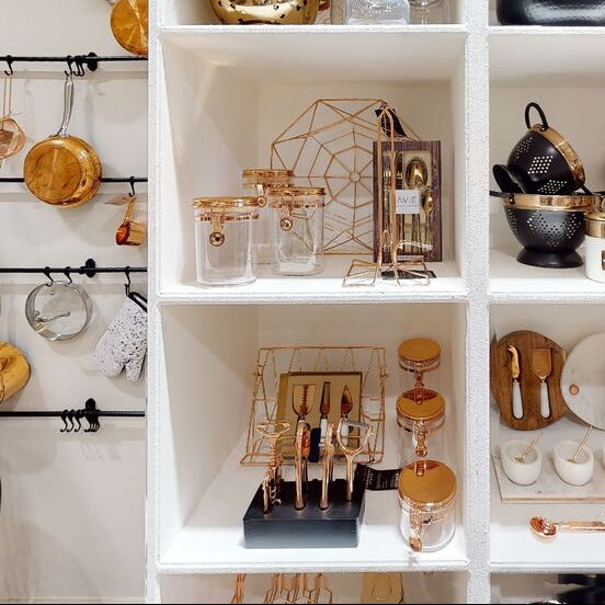 Kitchen shelves with various utensils and cookware