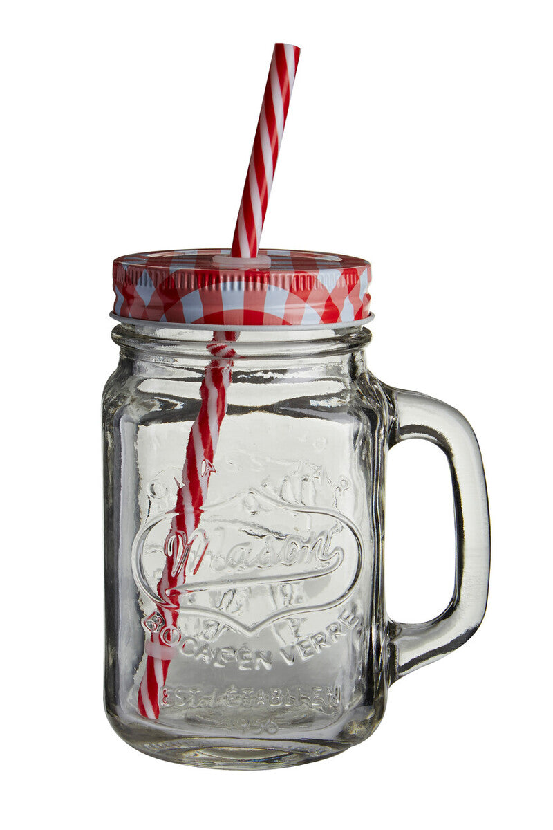 Clear glass mason jar with a red and white checkered lid and straw on a white background