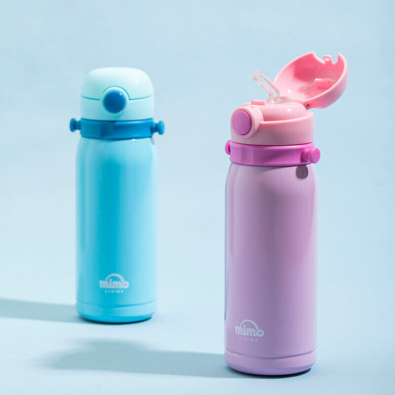 Two insulated cups, one blue and one pink, on a light gray background.