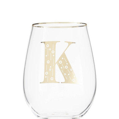 Clear wine glass with a gold letter &