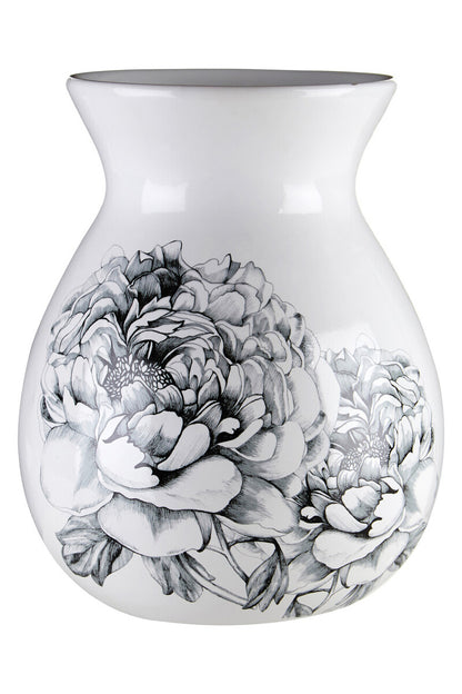 White vase with black floral design on a white background