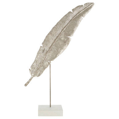 Decorative feather on a stand with a white background