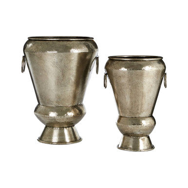 Two metallic vases on a white background