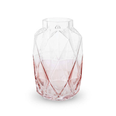 Clear glass vase with pink accent on a white background