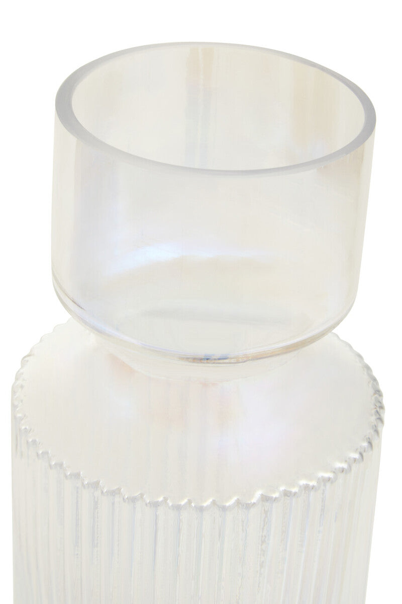 White glass candle holder with ribbed design on a white background