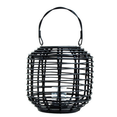 Black woven lantern with a handle on a white background