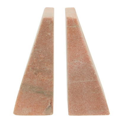 Two triangular stone wedges on a white background