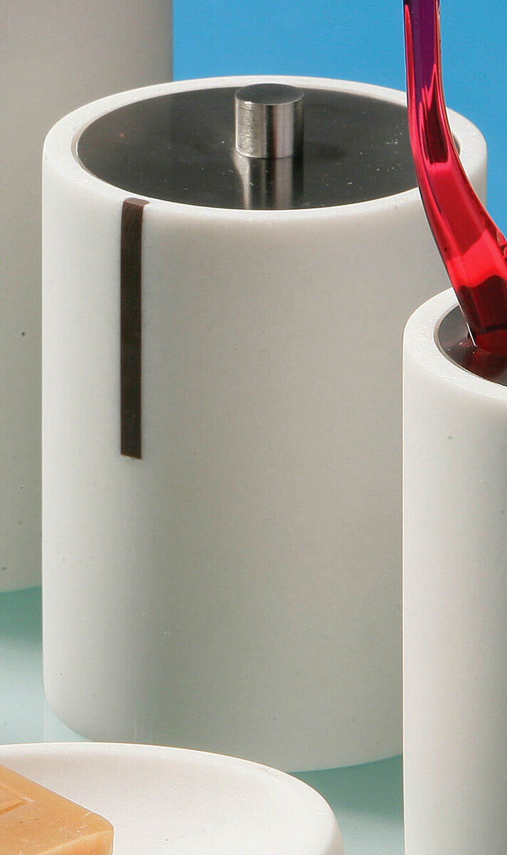 White cylindrical container with a red tool inside on a light blue background