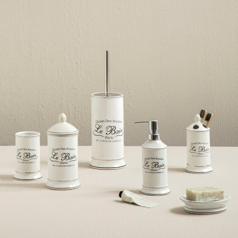 Set of white ceramic bathroom accessories with &