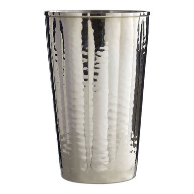Silver metallic tumbler with a textured surface on a white background