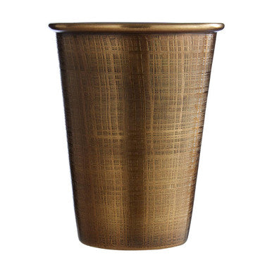 Bronze-colored wastebasket with woven texture on a white background