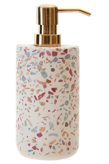 Terrazzo-patterned soap dispenser with gold pump on a white background