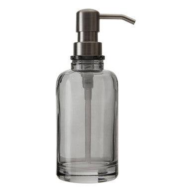Clear glass soap dispenser with metallic pump on a white background