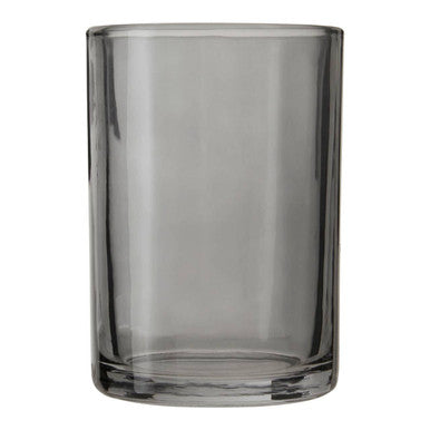 Clear glass tumbler on a white background