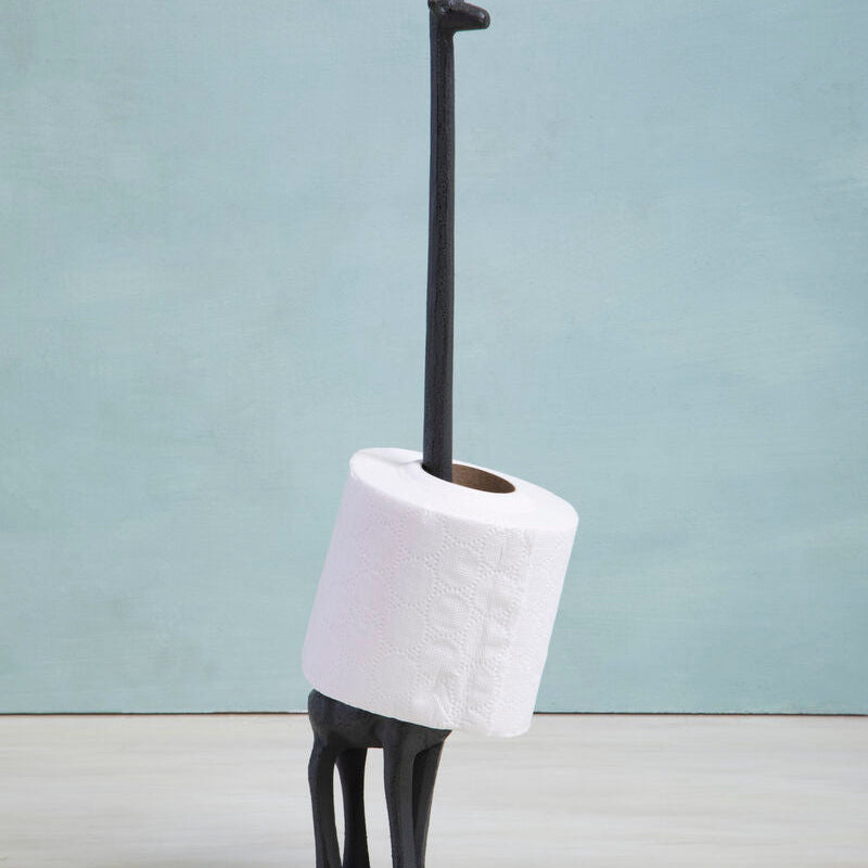 Black metal stand with a roll of toilet paper on a light blue background