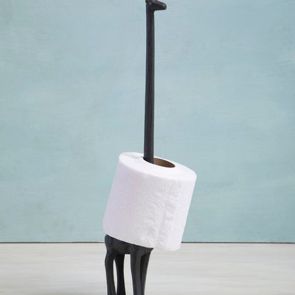 Black metal stand with a roll of toilet paper on a light blue background