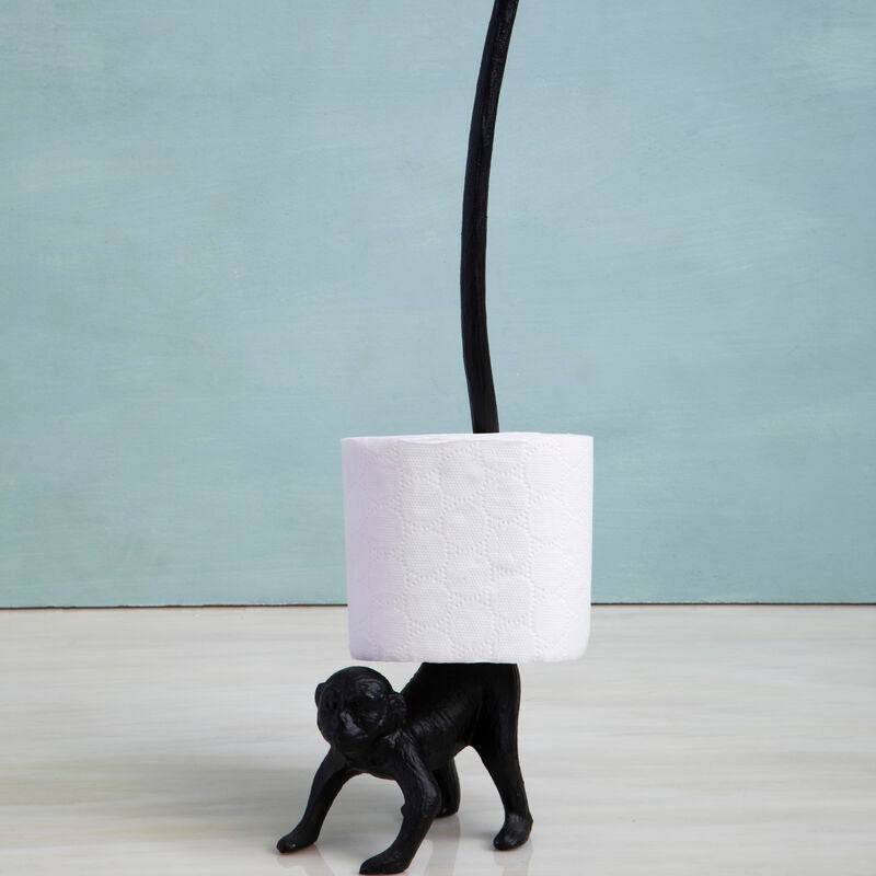 Black dog-shaped holder with a white lampshade on a light blue background