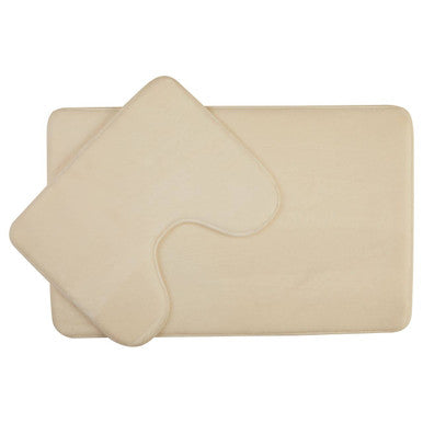 Beige bath mat with a textured pattern on a white background