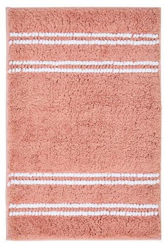 Pink bath mat with white stripes on a plain background