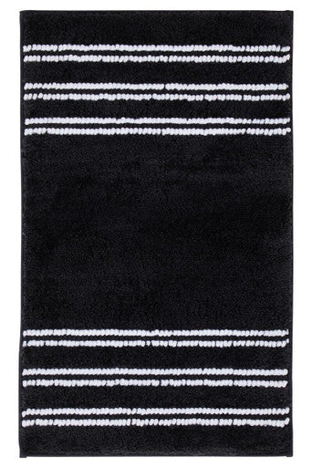 Black rug with white striped pattern