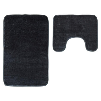 Black bath mat and toilet cover set on a white background