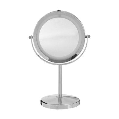 Chrome stand-up makeup mirror on a white background